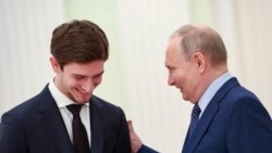 Владимир Путин и Али Кадыров. Источник: телеграм-канал Рамзана Кадырова