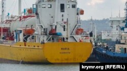 Ukraine, Crimea - in the port of Kerch ship went down under a foreign flag, 21Dec2015