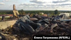 Әскери қоймадағы жарылыстан бүлінген үйдің орны. Ресей, Красноярск өлкесі, Каменка ауылы. 13 тамыз 2019 жыл.