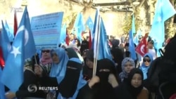 Çində repressiyalar nəticəsində pərən-pərən düşən uyğur ailələri