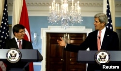 Ahmet Davutoglu və John Kerry