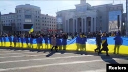 Під час акції у центрі Херсона проти російської окупації, 13 березня 2022 року