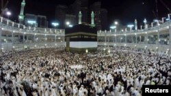 Saudia Arabia -- Muslim pilgrims pray around the holy Kaaba at the Grand Mosque, during the annual hajj pilgrimage in Mecca, October 1, 2014